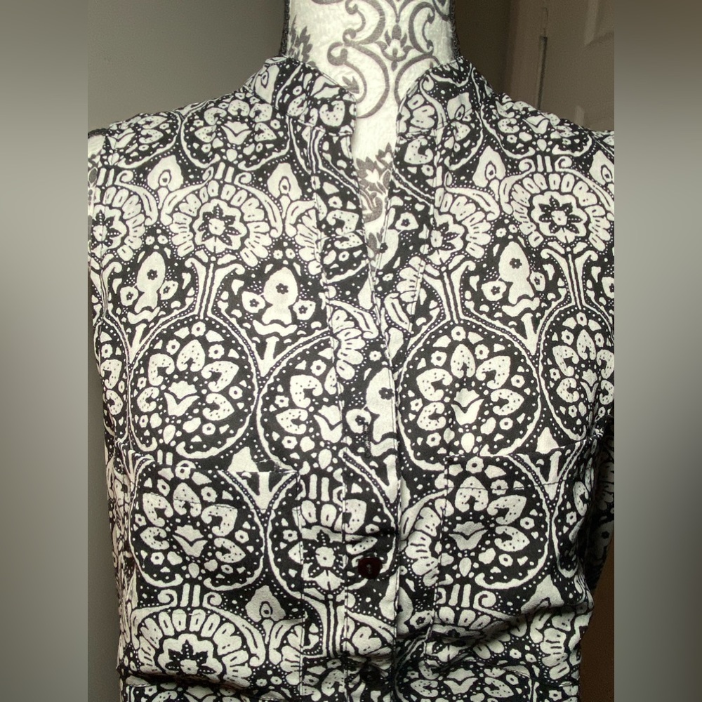 Sleeveless open back blouse